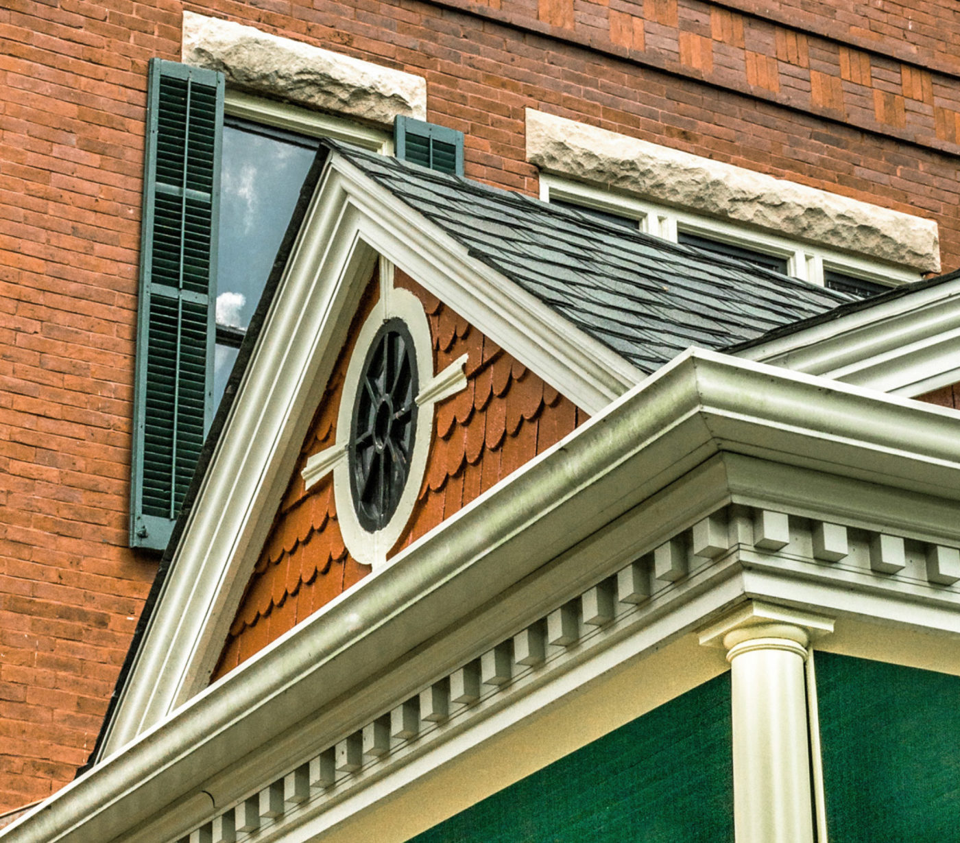 A detail photograph of the pediment of Historic Westwood House.