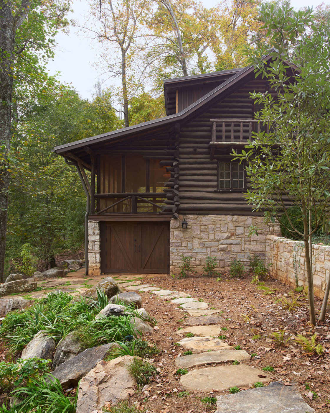 A view of one of the log cabins from the side.