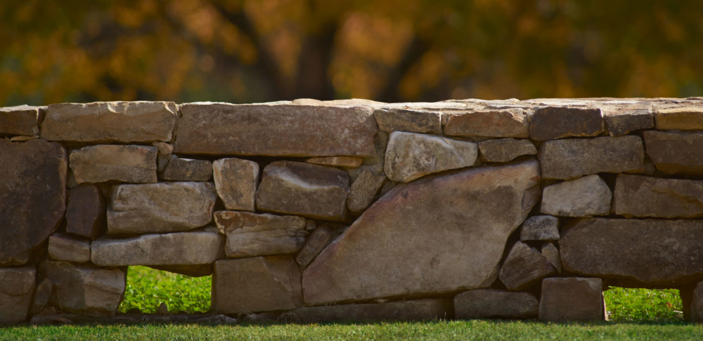 Photo of the stacked stone wall.